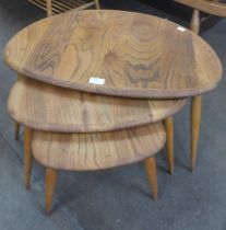 An Ercol Blonde elm and beech pebble shaped nest of tables