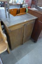 A George III pine two door wall cupboard