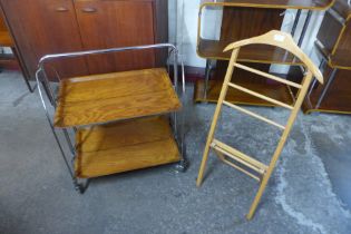 A gentleman's beech valet stand and a folding trolley