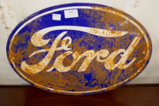 An enamelled metal Ford advertising sign