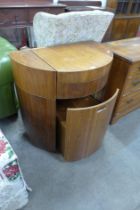 A walnut demi-lune dressing table with chair