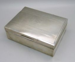 A silver cigarette box, Birmingham 1949, total weight with liner 326g, 11.5cm wide