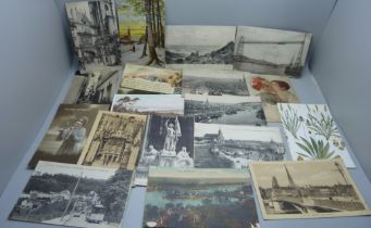 A collection of approximately forty postcards, including WWI period with field censor stamps