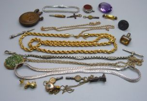 An early 20th Century lighter, chains, swivel fob, stone set bracelet, watch keys, etc.