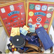 A collection of Boys Brigade items, two framed displays and other badges, belts, ties, etc.