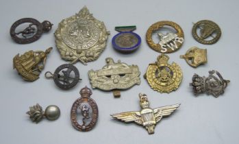 Assorted cap badges including an India Parachute Regiment badge, Argyle and Sutherland, Cape Corps -