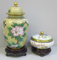 A cloisonne vase and cover and a cloisonne lidded pot and cover, both with wooden bases