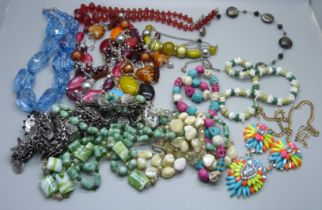 A bag of coloured bead necklaces, etc.