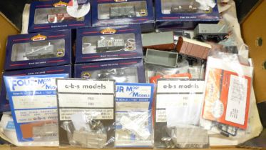 A collection of model train parts, a.b.s models and other sealed sets and seven boxed Bachmann OO