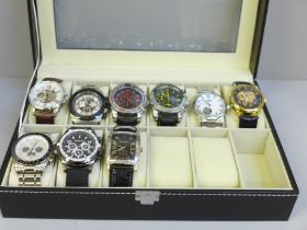 A case of nine wristwatches, Infinate, Invicta with spare links, Skmei x2, Winner and Ellesse with