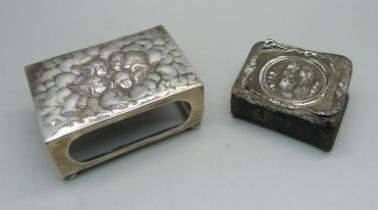 A silver matchbox holder and a prayer book with silver cover, a/f, both with Reynolds Angels detail,