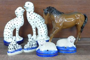 A Royal Doulton figure of a horse and three pairs of Staffordshire figures; sheep, one ear a/f and