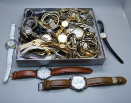 A box of lady's and gentleman's wristwatches including Seiko, Accurist, Avia, etc.