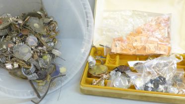 A tub of wristwatch parts