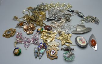 A bag of gold tone, plated and other costume jewellery