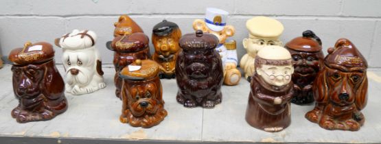 A collection of eleven novelty biscuits and sweets lidded jars, includes P & K sad dog, Teddy bear