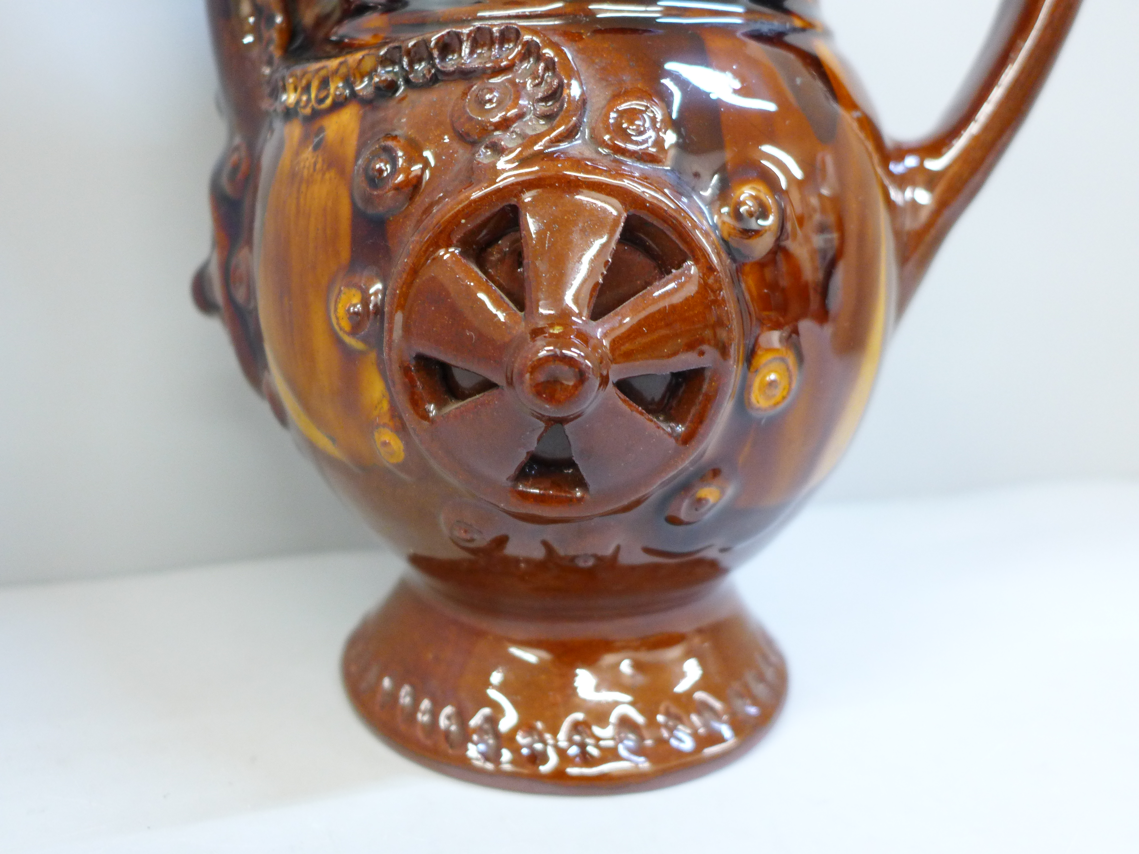 A treacle glaze pottery puzzle jug, 26cm - Image 2 of 6