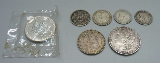 A Canada 9999 fine silver 1oz $5 coin, an 1880 US dollar coin, San Francisco mint, 26.7g, two one