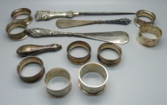 A set of six silver napkin rings, one a/f, three other silver napkin rings, three silver handled