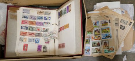 Stamps; albums, a folder and loose stamps **PLEASE NOTE THIS LOT IS NOT ELIGIBLE FOR POSTING AND