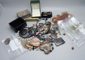 A silver matchbox holder and rattle, both a/f, and a collection of costume jewellery