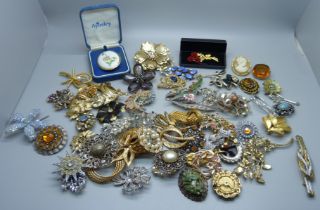 Sixty costume brooches