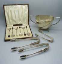 Three pairs of silver sugar bows, a silver sugar bowl and six silver coffee bean spoons, (one a/