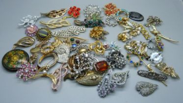 Sixty costume brooches