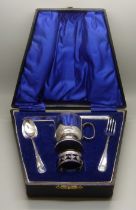 A cased plated christening set