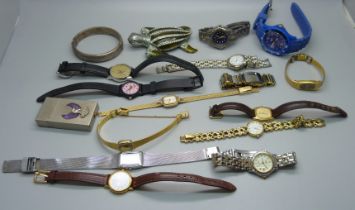 A silver bangle and lady's wristwatches