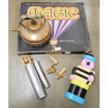 A Thomas Salter magic set, a copper kettle, a Bertie Bassett money box and skeleton clock parts (