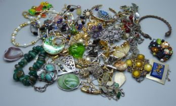 A bag of costume jewellery, cufflinks, etc.