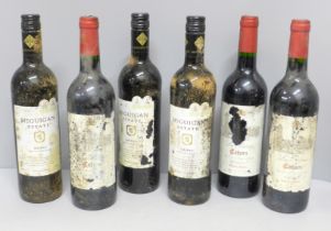 Three bottles of McGuigan Estate South Australian Shiraz (2013) and three bottles of La Patrie