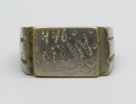 A WWII related ring engraved Anzio 1944, size U