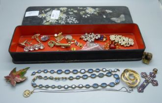 Enamelled and other jewellery in a lacquered glove box, including blue stone necklet and bracelet,