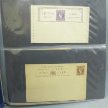 Stamps; an album of Commonwealth postal stationery, Queen Victoria onwards (154 items)