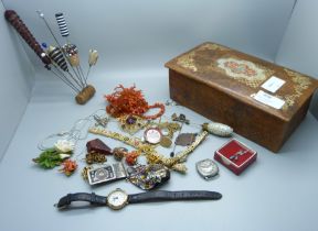 A box of jewellery including amber, coral, silver, hat pins, etc.