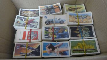 A box of tea cards, 32 sets, over 1100 cards