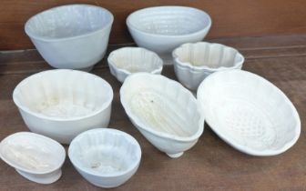 Nine medium and small jelly moulds, one with hairline crack **PLEASE NOTE THIS LOT IS NOT ELIGIBLE