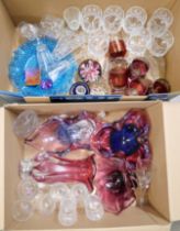 A collection of glassware including coloured glass bowls, drinking glasses, paperweights, etc. **
