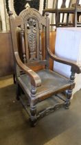 A Victorian Gothic Revival oak Bishops chair