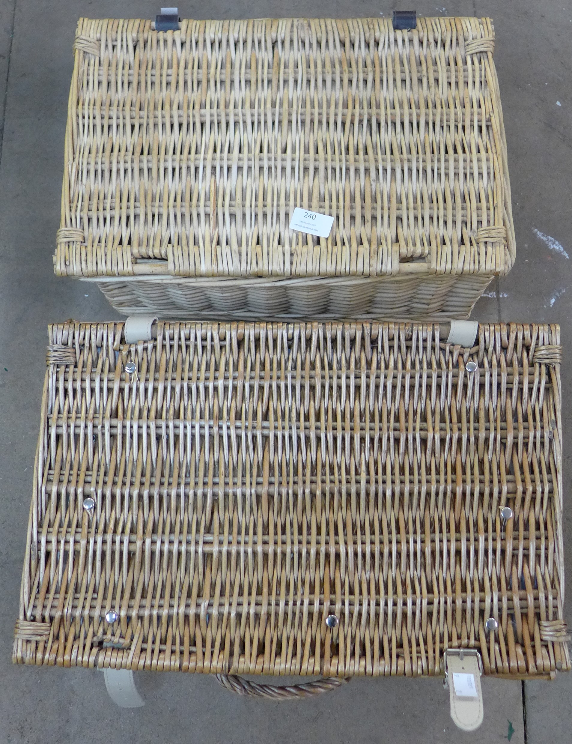 Two wicker picnic baskets