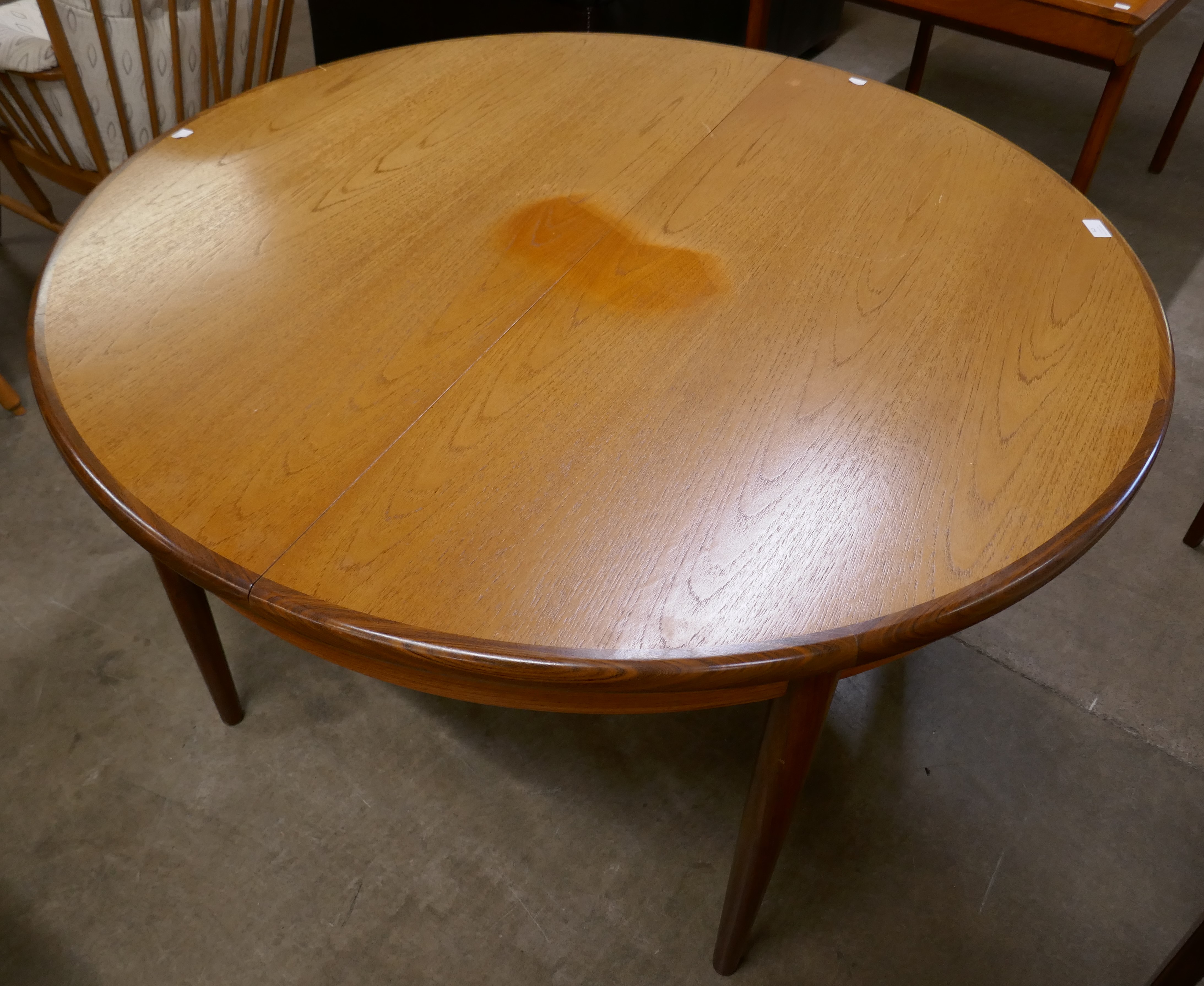 A G-Plan Fresco teak circular extending dining table