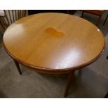 A G-Plan Fresco teak circular extending dining table