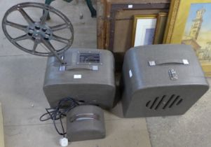 A Bell & Howell film projector, speaker and transformer