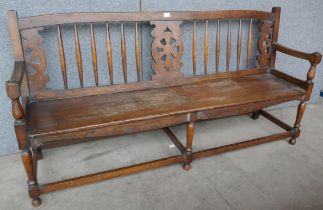 An early 20th Century oak and elm bench