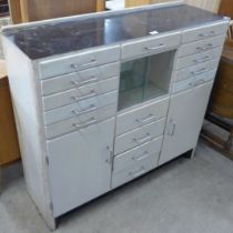 A mid 20th Century painted dentist cabinet