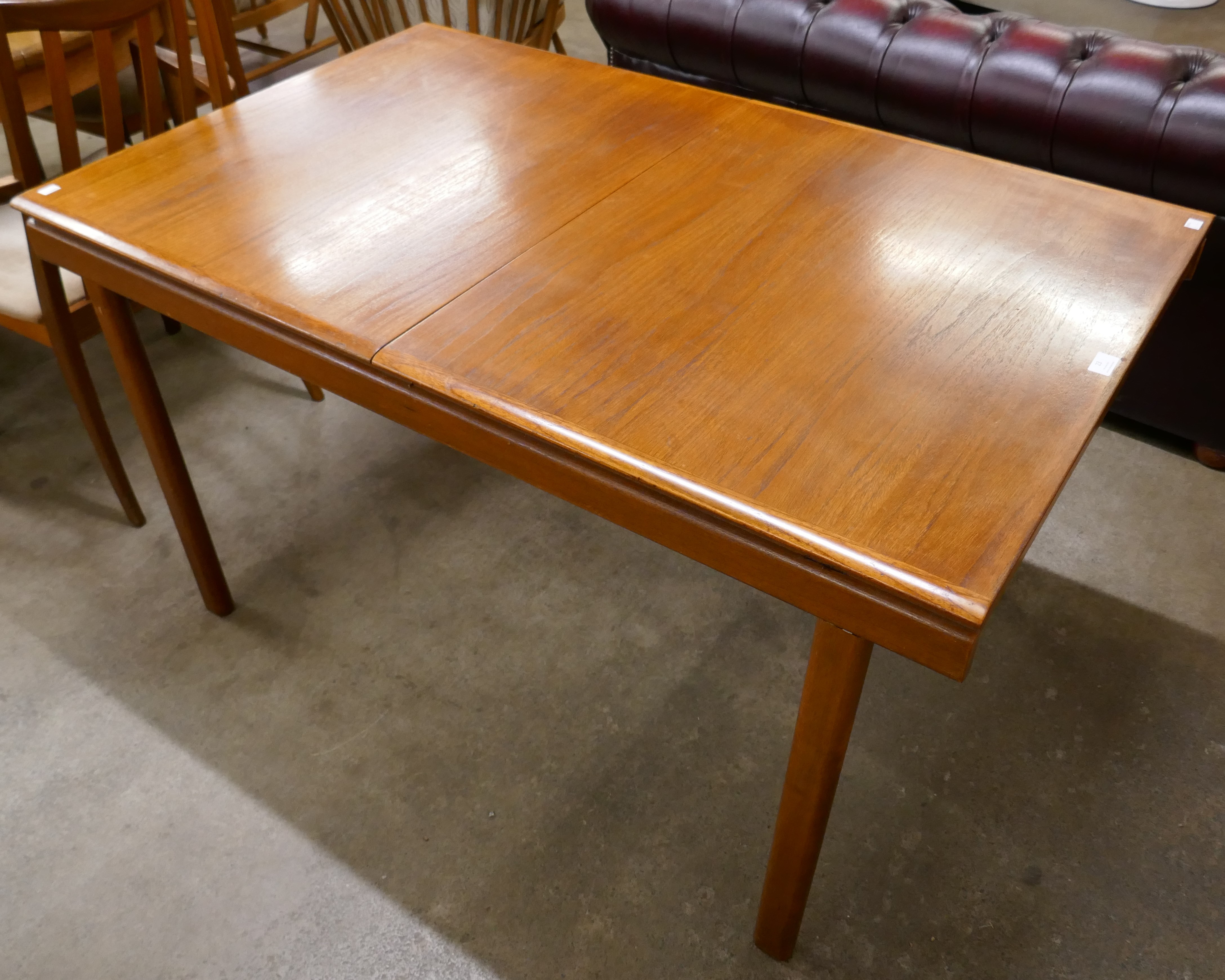 A White & Newton teak rectangular extending dining table