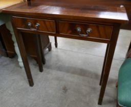 A mahogany two drawer console table