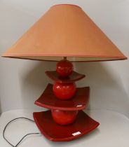 A 1960s style red table lamp